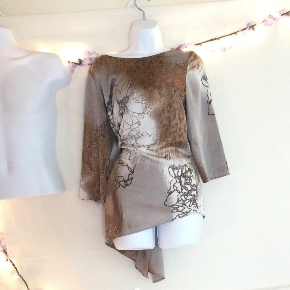 - Travelers collection by Chico’s . Women’s dress blouse . Silk material